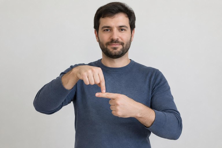 A signer bringing one index finger down onto the other index finger held horizontally